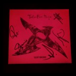 Full band autographed copy of Twelve Foot Ninja's album " Silent Machine"